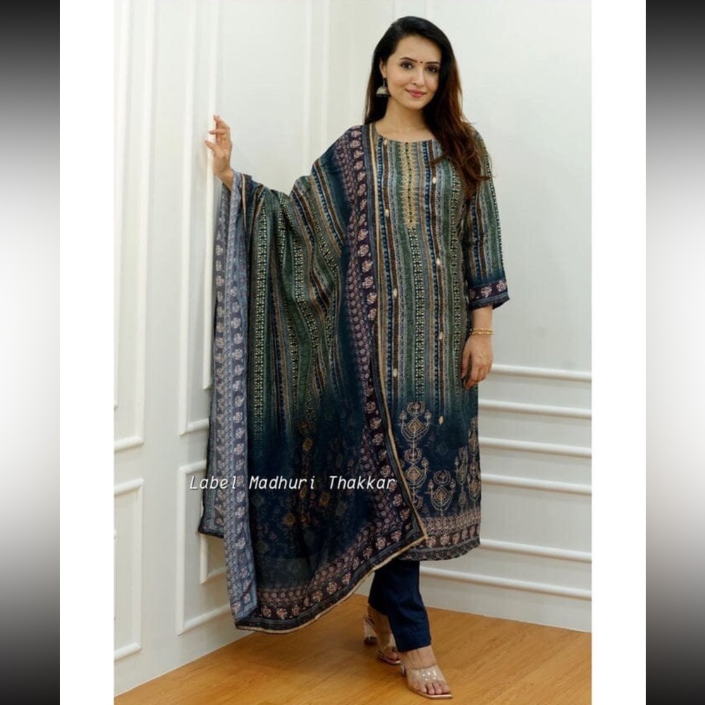 Beautiful navy blue suit set with hand embroidery zari weaving and prints